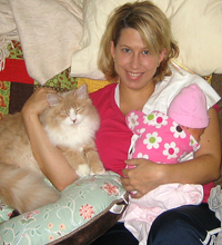 newborn with mother and family Siberian cat